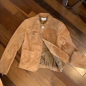 A brown leather jacket 100% leather lining